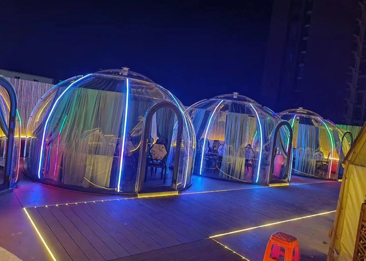 restaurant polycarbonate domes lit at night