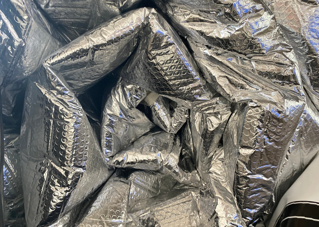 Close-up of bubble reflective insulation with a textured pattern for glamping dome tent